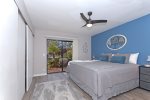 Bedroom 2 boasts direct access to an outdoor patio